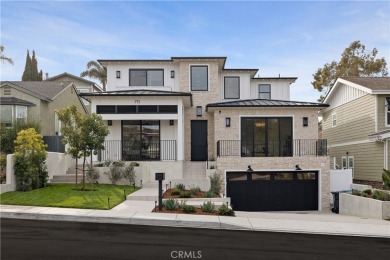 This stunning new construction home in Manhattan Beach offers 6