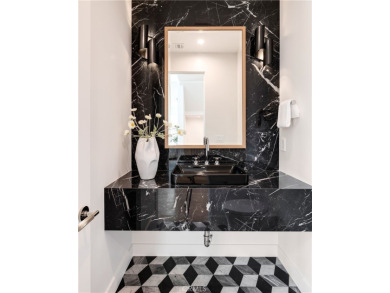 This stunning new construction home in Manhattan Beach offers 6