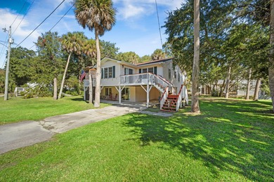 Just a short walk from the sand, this classic Edisto Beach home