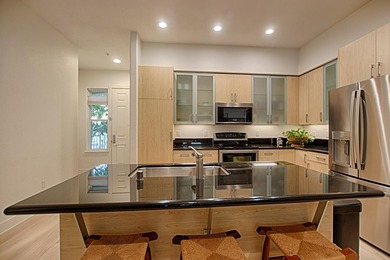 Downtown living at its best with this luxurious, high ceiling