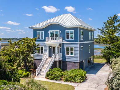 Enjoy coastal living at its finest on Figure Eight, an exclusive