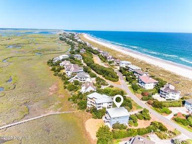 Enjoy coastal living at its finest on Figure Eight, an exclusive