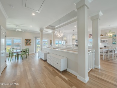 Enjoy coastal living at its finest on Figure Eight, an exclusive