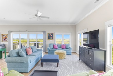 Enjoy coastal living at its finest on Figure Eight, an exclusive