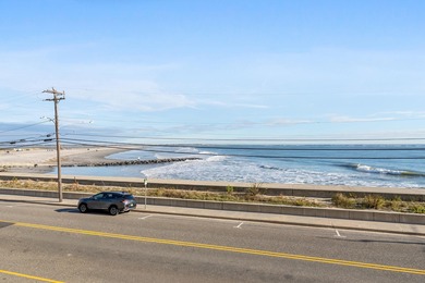 OCEAN VIEWS!  DIRECT BEACHFRONT VIEWS!  Rare opportunity to own