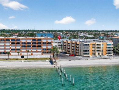 COASTAL LUXURY LIVING WITH ELEVATOR STEPS FROM THE SAND!
