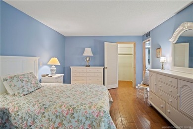 Enjoy the ease of Florida living in this first floor, end unit