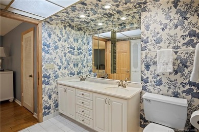 Enjoy the ease of Florida living in this first floor, end unit