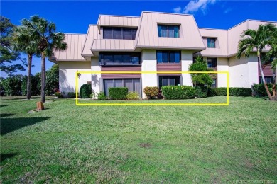Enjoy the ease of Florida living in this first floor, end unit