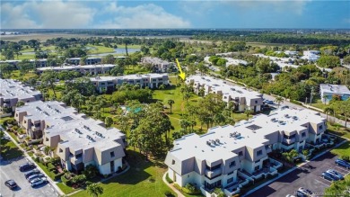 Enjoy the ease of Florida living in this first floor, end unit