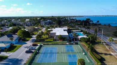 Enjoy the ease of Florida living in this first floor, end unit