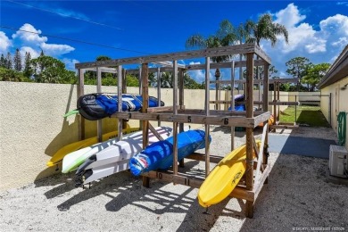 Enjoy the ease of Florida living in this first floor, end unit