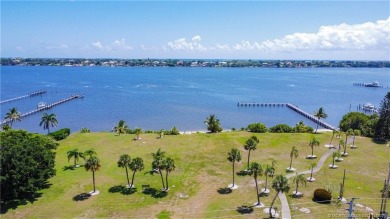 Enjoy the ease of Florida living in this first floor, end unit