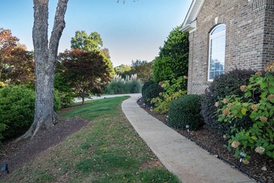 Located in the beautiful, gated Reserve section of Woodfin Ridge