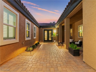 Stunning estate on a privately gated half acre lot. This