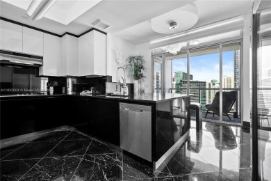 This exceptional 3-bedroom, 4-bath residence at the prestigious