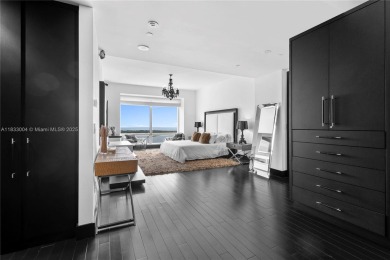 This exceptional 3-bedroom, 4-bath residence at the prestigious