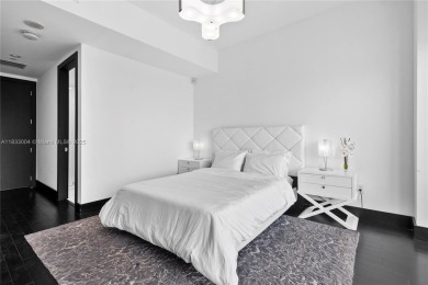 This exceptional 3-bedroom, 4-bath residence at the prestigious