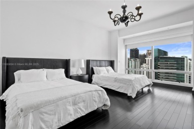 This exceptional 3-bedroom, 4-bath residence at the prestigious