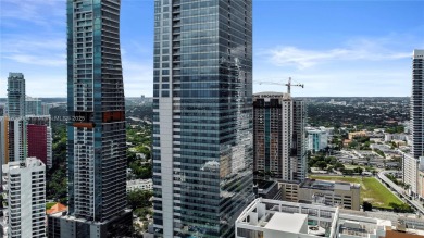 This exceptional 3-bedroom, 4-bath residence at the prestigious