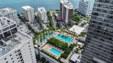 This exceptional 3-bedroom, 4-bath residence at the prestigious