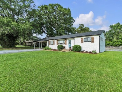 Welcome to this beautifully updated 4-bedroom, 2.5-bathroom home