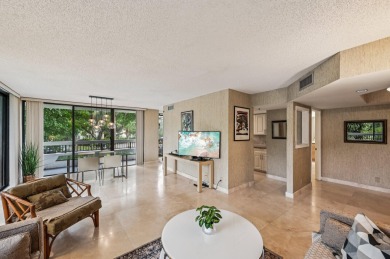 Discover this rare oversized 3-bedroom, 2-bath condo offering