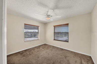 MOVE-IN READY and IMMACULATE 2 bedroom, 2 bath condo END UNIT in