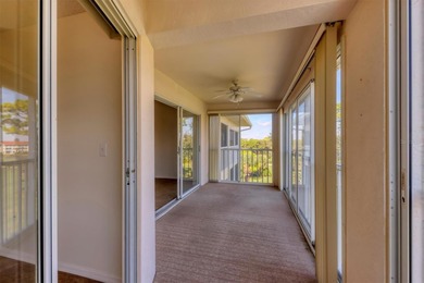 MOVE-IN READY and IMMACULATE 2 bedroom, 2 bath condo END UNIT in