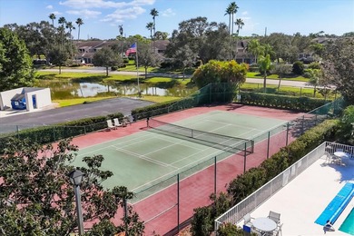 MOVE-IN READY and IMMACULATE 2 bedroom, 2 bath condo END UNIT in