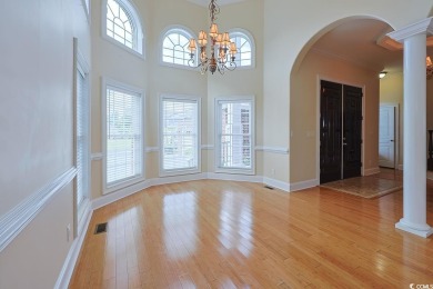 Experience luxury waterfront living in this exquisite all-brick