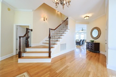 Experience luxury waterfront living in this exquisite all-brick