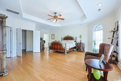 Experience luxury waterfront living in this exquisite all-brick