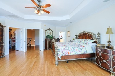 Experience luxury waterfront living in this exquisite all-brick