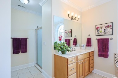 Experience luxury waterfront living in this exquisite all-brick