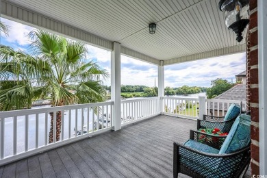 Experience luxury waterfront living in this exquisite all-brick