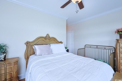 Experience luxury waterfront living in this exquisite all-brick