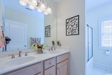 Experience luxury waterfront living in this exquisite all-brick