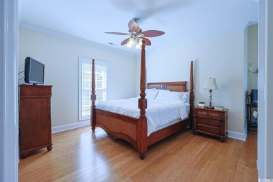 Experience luxury waterfront living in this exquisite all-brick