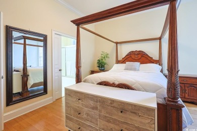 Experience luxury waterfront living in this exquisite all-brick