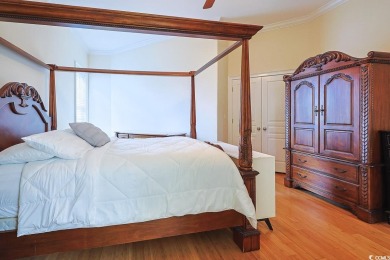 Experience luxury waterfront living in this exquisite all-brick