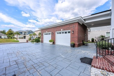 Experience luxury waterfront living in this exquisite all-brick