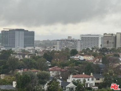 Stylish and spacious 17th-floor condo featuring high ceilings