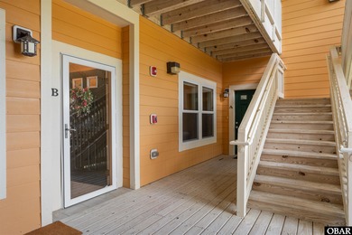 Welcome to Villas at Waterside Unit 100B, a meticulously