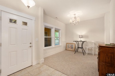 Welcome to Villas at Waterside Unit 100B, a meticulously