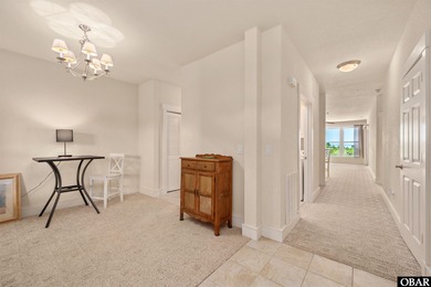 Welcome to Villas at Waterside Unit 100B, a meticulously