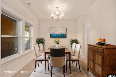 Welcome to Villas at Waterside Unit 100B, a meticulously