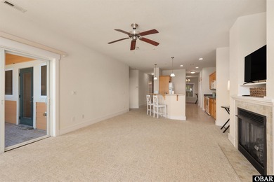 Welcome to Villas at Waterside Unit 100B, a meticulously