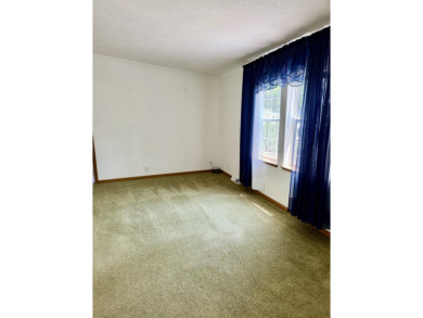 Easy living in the 2 Lake town of Onekama. Home sits on a street