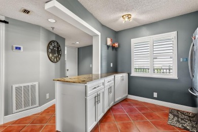 Light, updated, and welcoming--this 2BR/2BA condo in Cypress